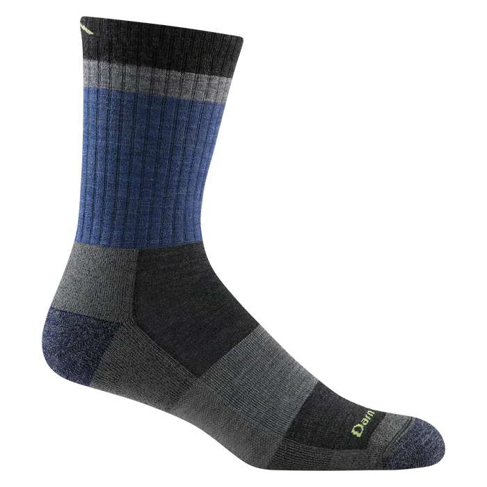 A single crew-length athletic sock shown on a plain white background. The sock features a ribbed blue and gray leg section, a dark charcoal heel and toe, and a small lime green Darn Tough logo near the toe.