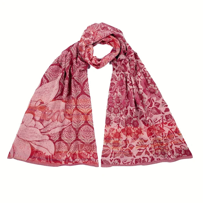Létol Louise Scarf in Ispahan Pink, draped and loosely knotted against a white background, showing a reversible Jacquard-woven organic cotton scarf in Indian pink, fuchsia, rose, and bright red — one side featuring large botanical rose and chrysanthemum motifs in a damask lattice, the other showing a dense all-over floral and bird pattern — with a woven Létol label visible at