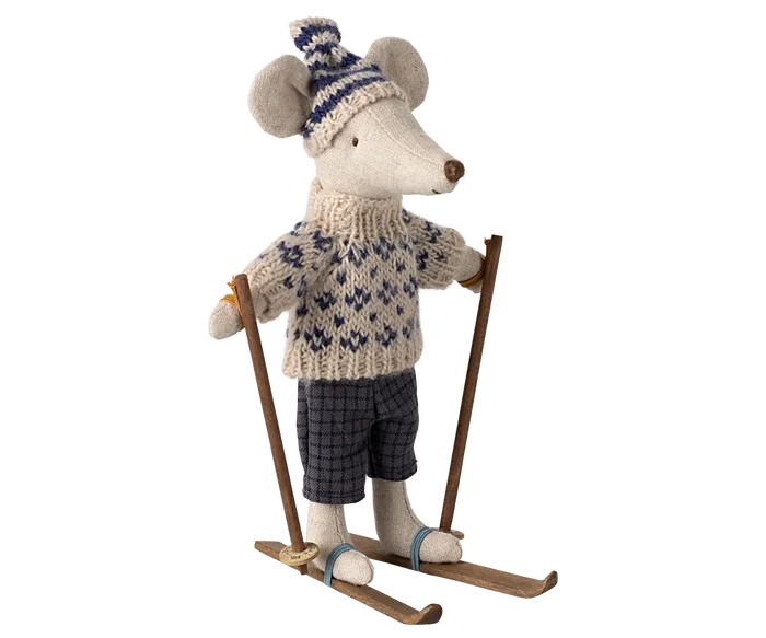 Maileg Winter Mouse Ski Dad — full front view of linen mouse doll wearing a striped knit pompom hat, cream and navy Fair Isle sweater, dark gingham shorts, and wooden skis with poles